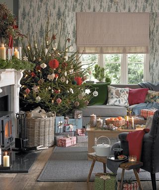 Living room with Christmas tree and piled up presents below