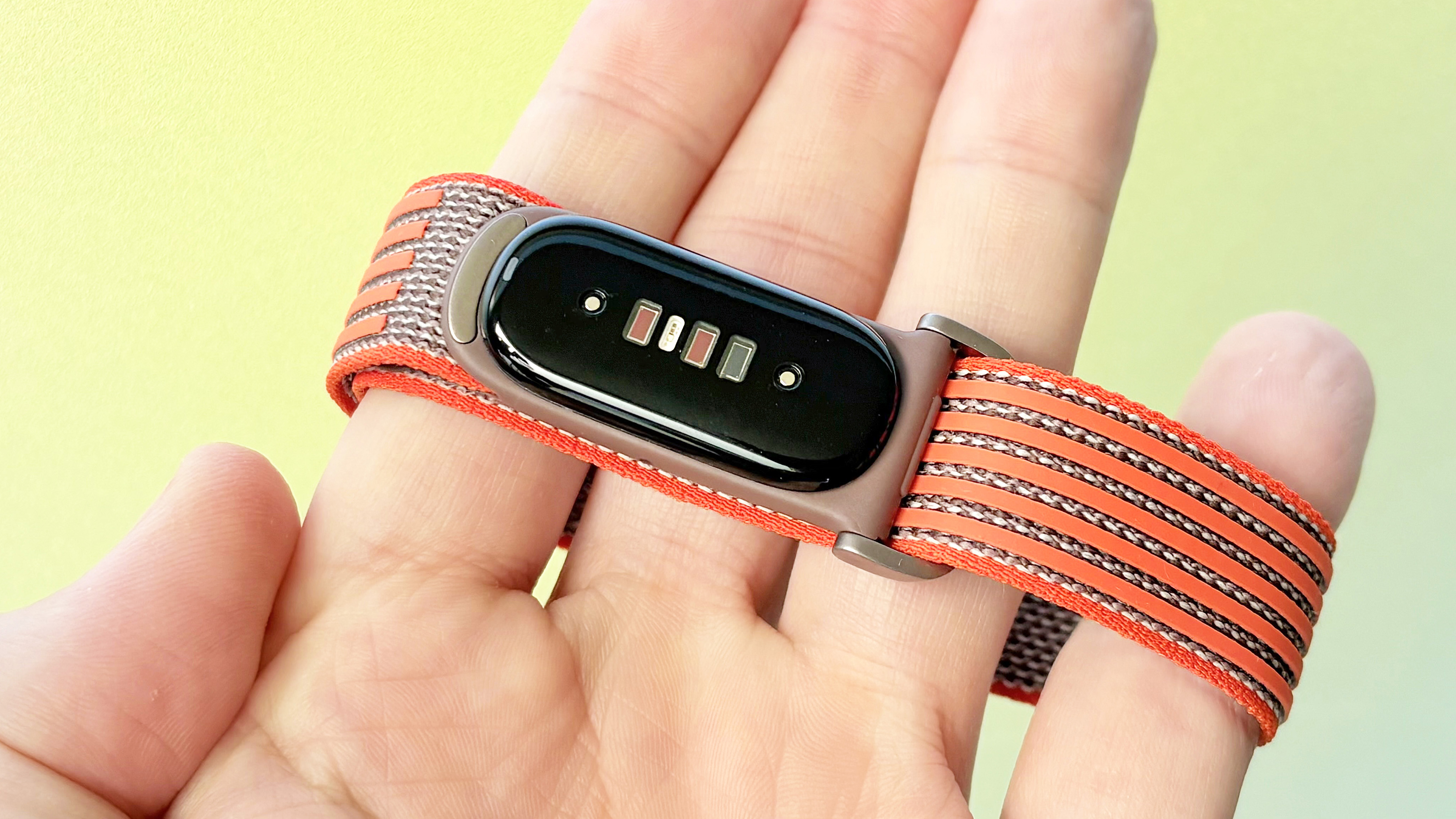 Close-up of the sensors on the Fitbit Air screenless fitness tracker