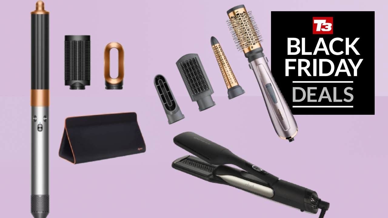 Selection of modern hair styling tools laid out on a table
