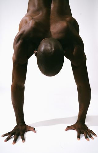 Close up of man doing a handstand