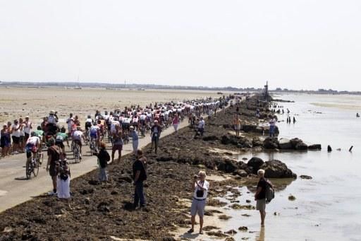 The Tour de France peloton on the Passage du Gois