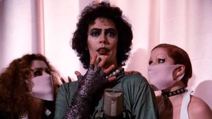 Patricia Quinn, Tim Curry, and Little Nell in The Rocky Horror Picture show