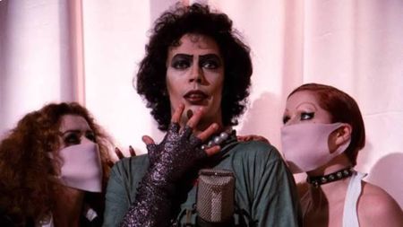 Patricia Quinn, Tim Curry, and Little Nell in The Rocky Horror Picture show