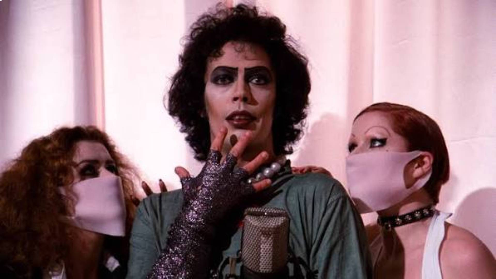 Patricia Quinn, Tim Curry, and Little Nell in The Rocky Horror Picture show
