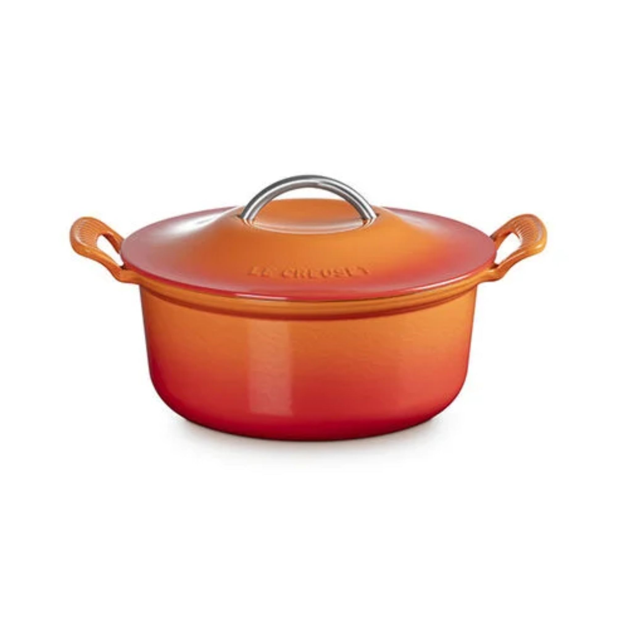 An orange Le Creuset Modern Heritage Round Dutch Oven with wide side handles and a curved silver lid handle, against a white background.