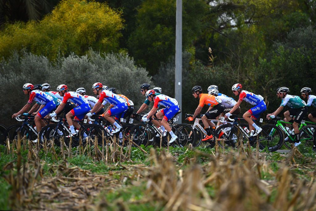 TORREVIEJA SPAIN FEBRUARY 05 LR Bram Welten of Netherlands Enzo Paleni of France and Team Groupama FDJ Xavier Mikel Azparren Irurzun of Spain and Team Euskaltel Euskadi Lars Van Den Berg of Netherlands and Team Groupama FDJ and The Peloton compete during the 73rd Volta A La Comunitat Valenciana 2022 Stage 4 a 1931km stage from Orihuela to Torrevieja VCV2022 on February 05 2022 in Torrevieja Spain Photo by Dario BelingheriGetty Images