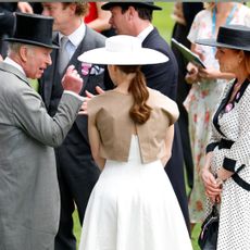 King Charles, Sarah Ferguson and Princess Eugenie talking at Royal Ascot
