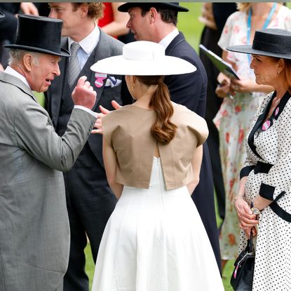 King Charles, Sarah Ferguson and Princess Eugenie talking at Royal Ascot