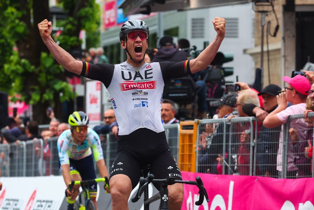 UAE Team Emiratess German rider Pascal Ackermann celebrates after he crossed the finish line to win the eleventh stage of the Giro dItalia 2023 cycling race 219 km between Camaiore and Tortona on May 17 2023 Photo by Luca Bettini AFP Photo by LUCA BETTINIAFP via Getty Images