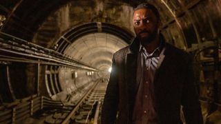 Luther (Idris Elba) in a tunnel