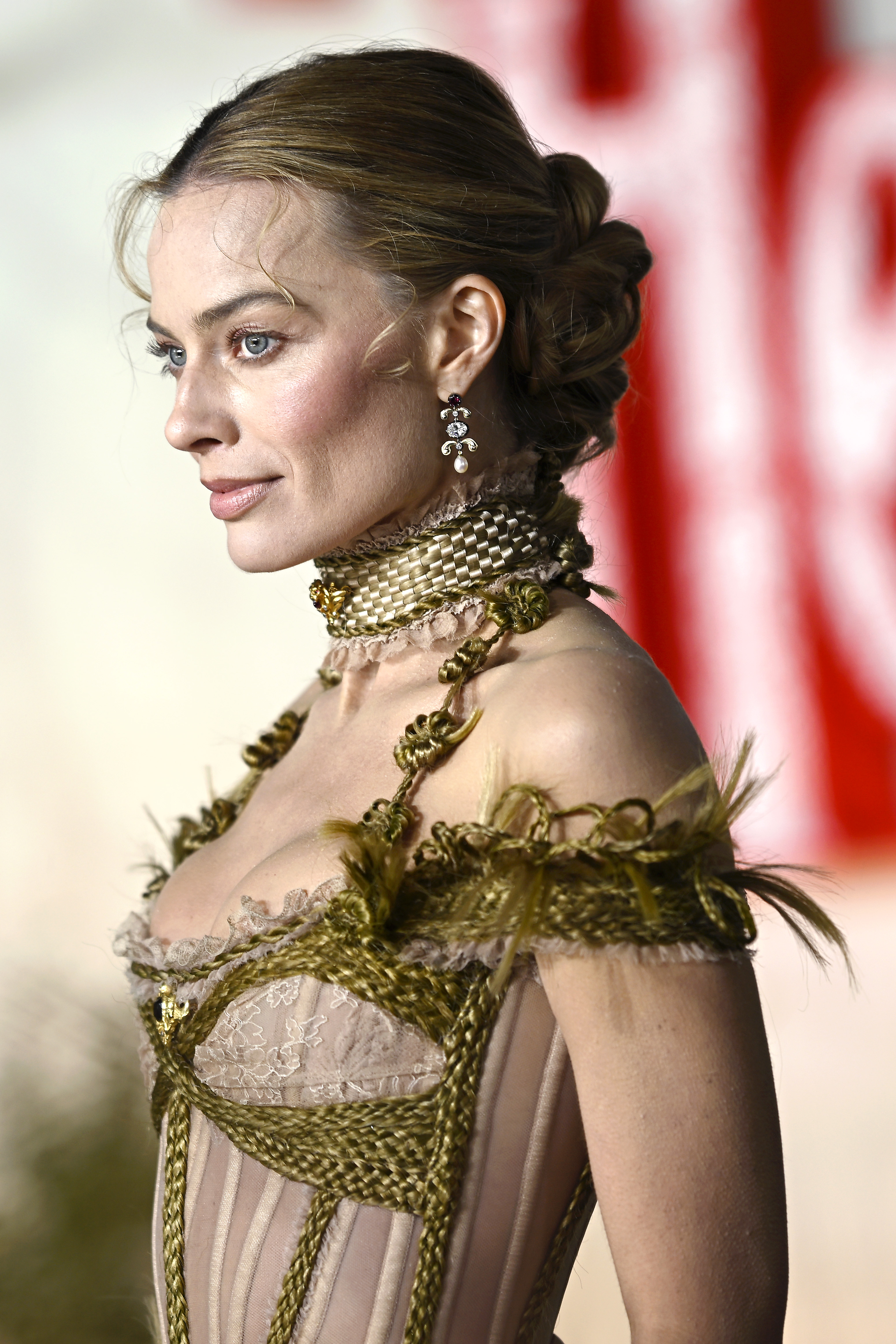 Margot Robbie wore a braided naked corset dress at the London premiere of Wuthering Heights