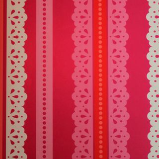 red lace effect wallpaper with red and white coloured patterns