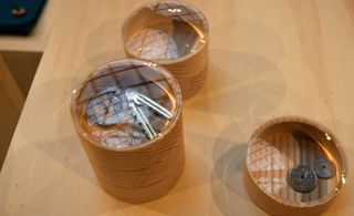 convex glass lids of Thomas Jenkins' desk containers