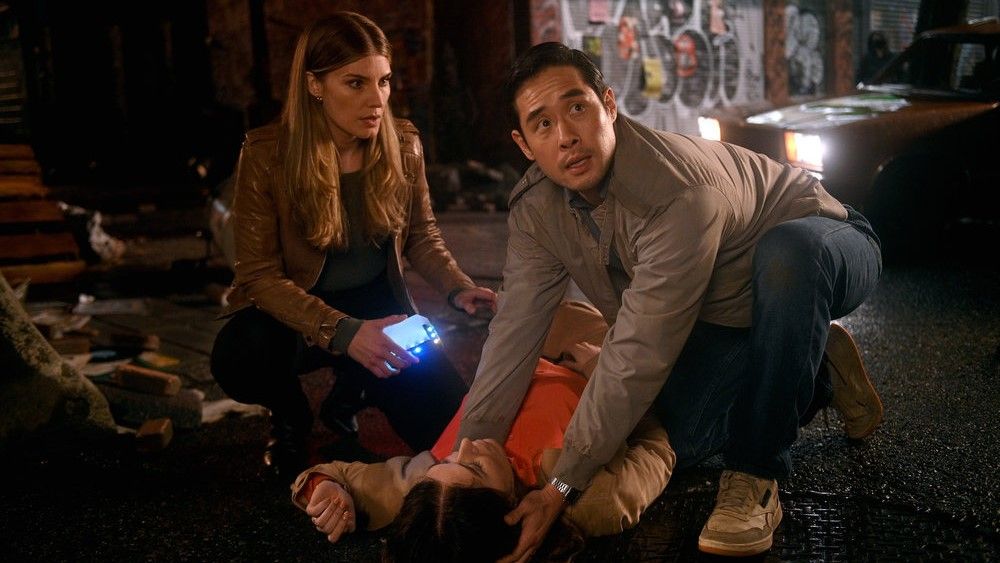 Raymond Lee and Caitlin Bassett in Quantum Leap