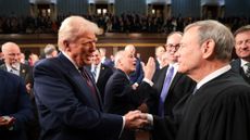 President Donald Trump thanks Chief Justice John Roberts after speech to Congress