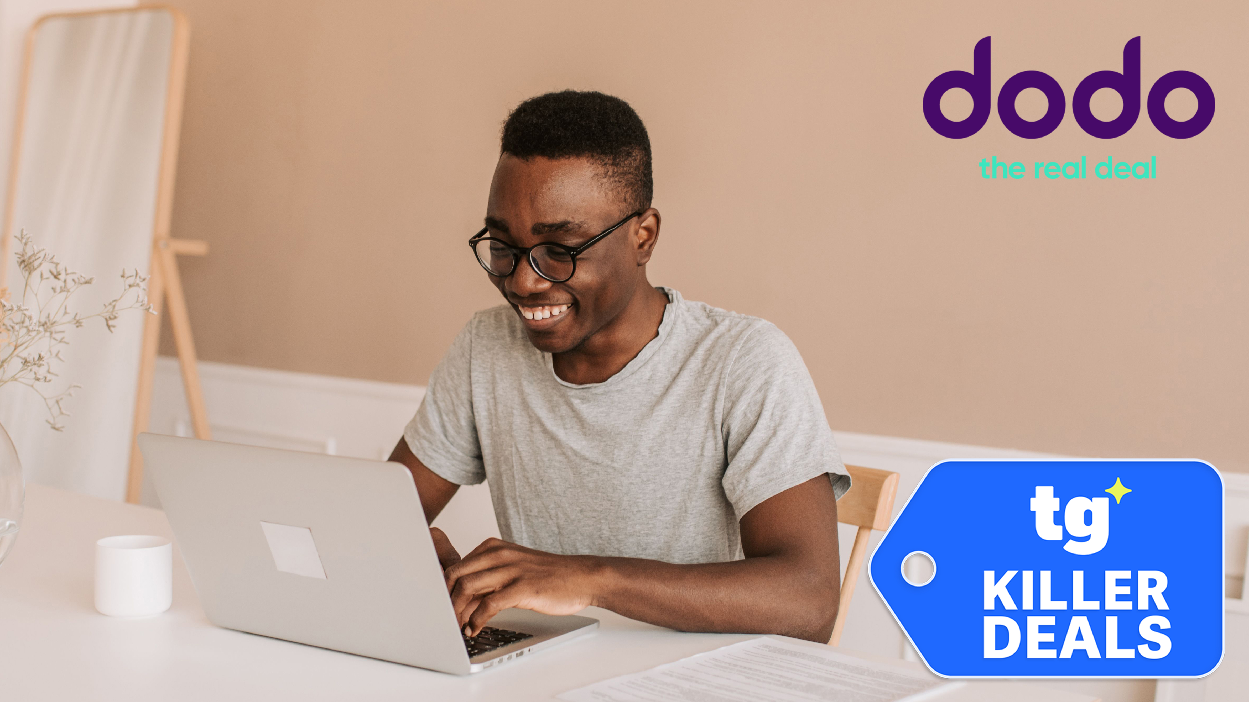 Man at laptop with dodo and tom's guide logo