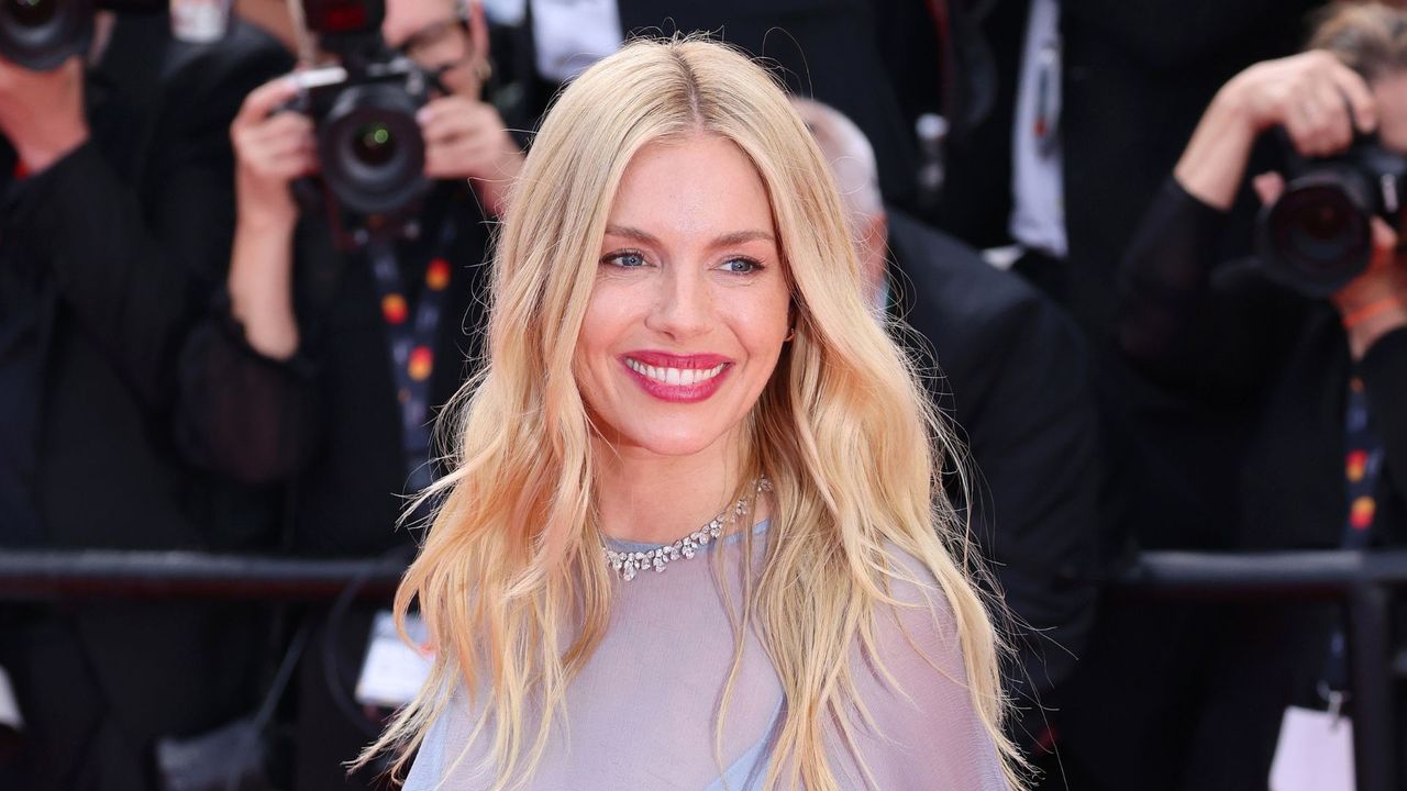 Sienna Miller attends the &quot;Horizon: An American Saga&quot; Red Carpet during the 77th Annual Cannes Film Festival at Palais des Festivals on May 19, 2024 in Cannes, France.