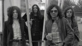 Camel in 1974 posing in front of a circus caravan