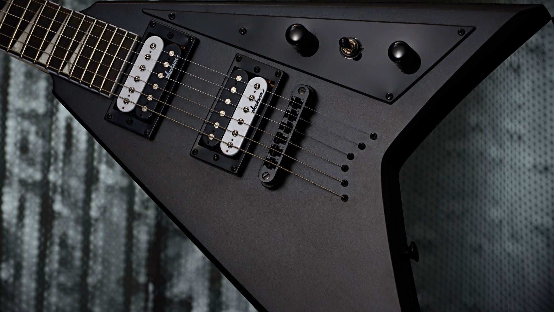 Close up of a Jackson Rhoads JS32T electric guitar