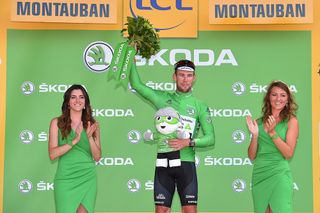 Mark Cavendish in the green jersey after stage 6