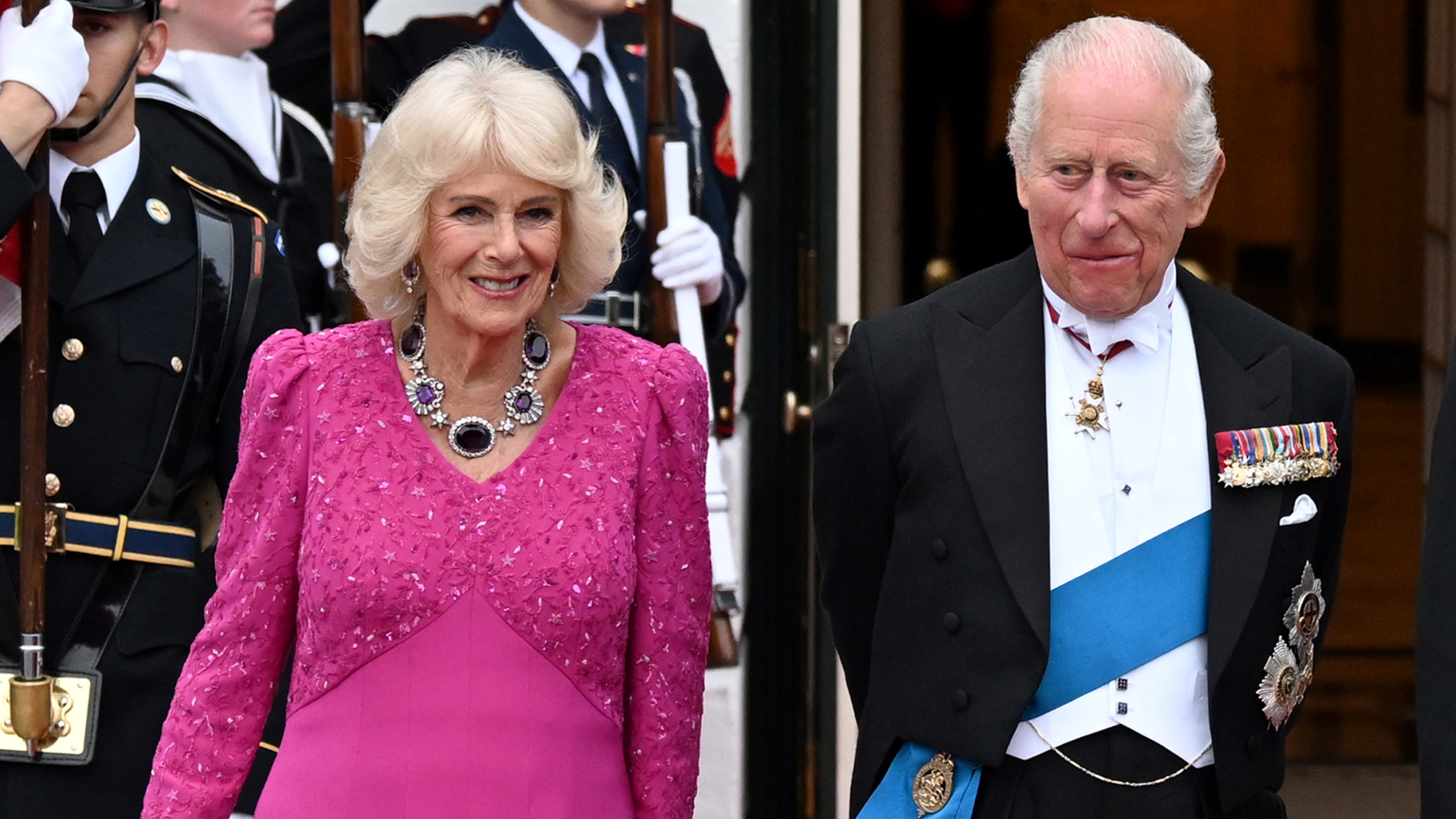 Queen Camilla and King Charles III pose outside during an official state dinner hosted by the President and First Lady at The White House