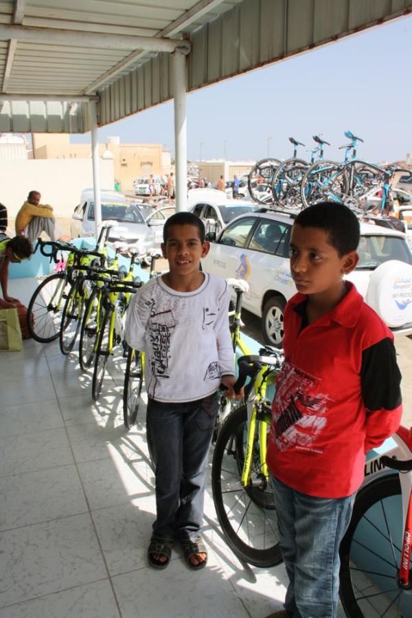 Local children kept guard of the bikes as the riders got changed in a small bar
