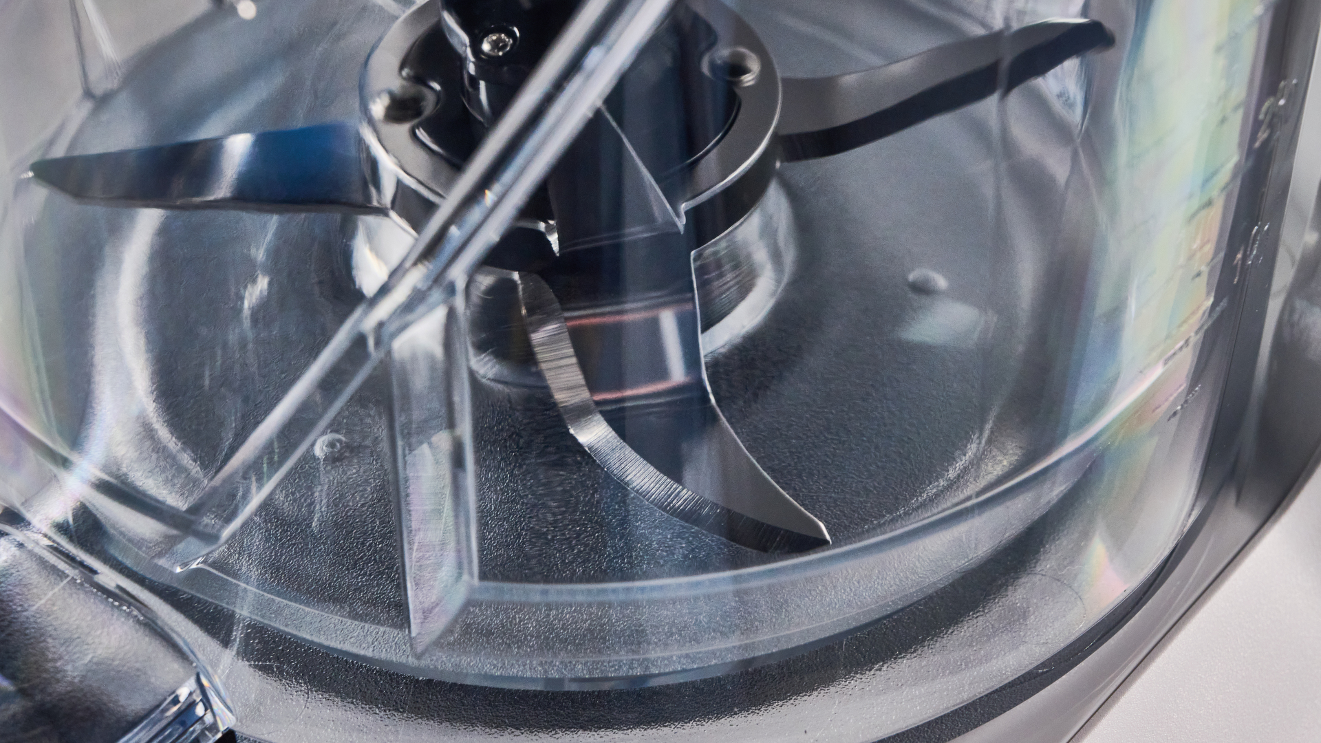 Tribest Backspin Blender photographed in front of a blue background