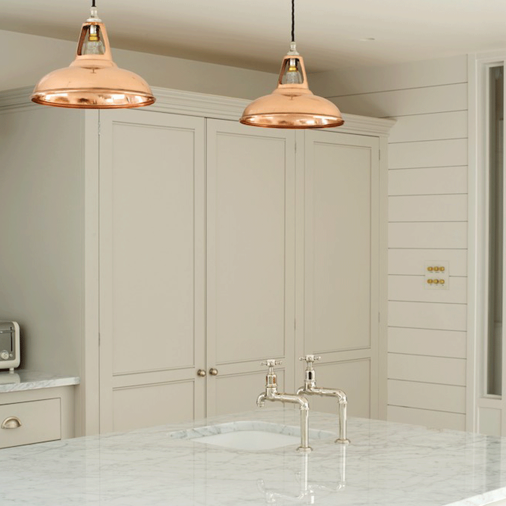 kitchen room with white wall copper lamp
