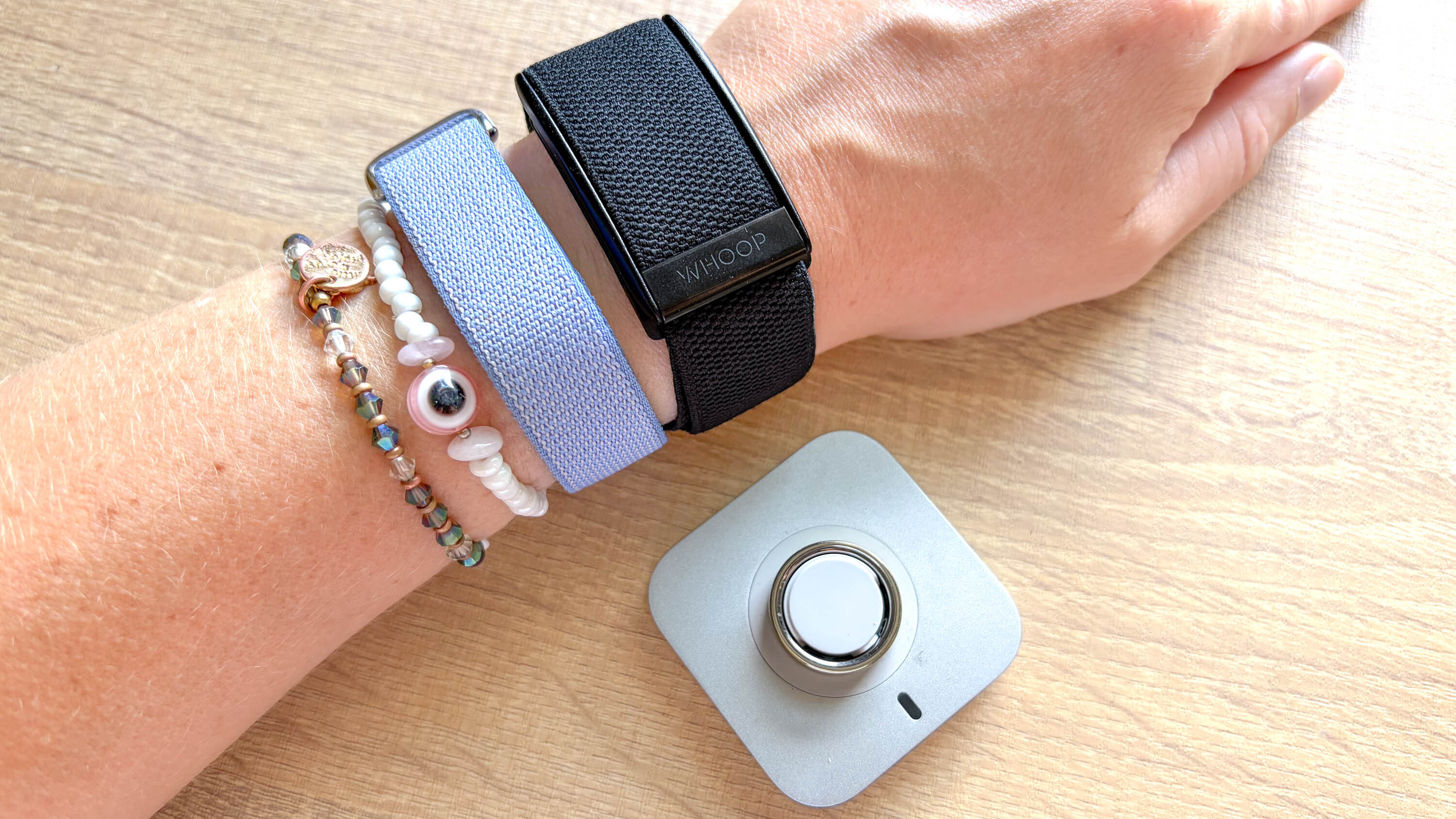 a photo of Oura Ring 5, Fitbit Air, Whoop MG