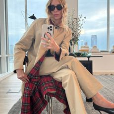 Olympia Gayot in trench coat and pants