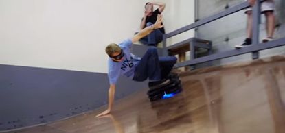 Watch Tony Hawk pivot, spin, and totally wipe out while riding the world's first hoverboard