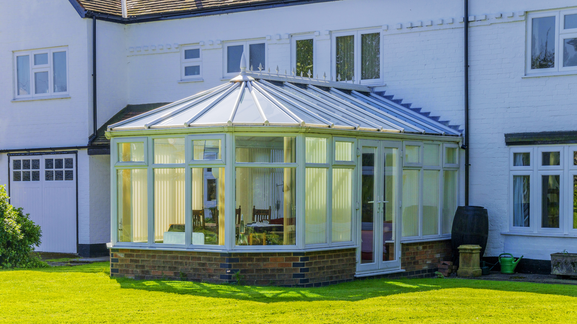 Glass conservatory on back of house
