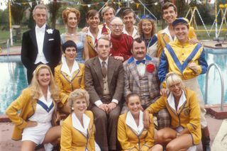 The Hi-de-Hi! cast around the show's famous Olympic-sized swimming pool.