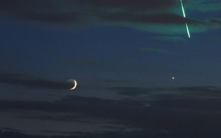 While photographing the conjunction of the moon on Venus on June 16, 2018, astrophotographer Uwe Reichert captured this birhgt-green fireball meteor as it fell from space and exploded in Earth's atmosphere over Belgium.