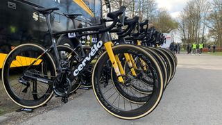 Tour de France Bikes 2021: Jumbo Visma's Cervelo bikes stacked in a rack outside a bus