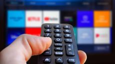 TV remote pointing at streaming apps