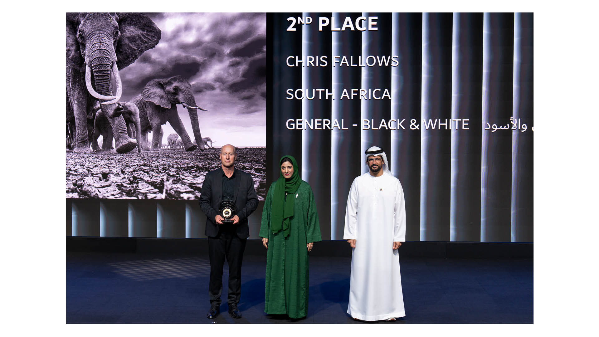 South African photographer and conservationist Chris Fallows collecting his trophy for runner-up in the General &amp;ndash; Black &amp;amp; White category of the 14th season of the Hamdan bin Mohammed bin Rashid Al Maktoum International Photography Awards (HIPA)