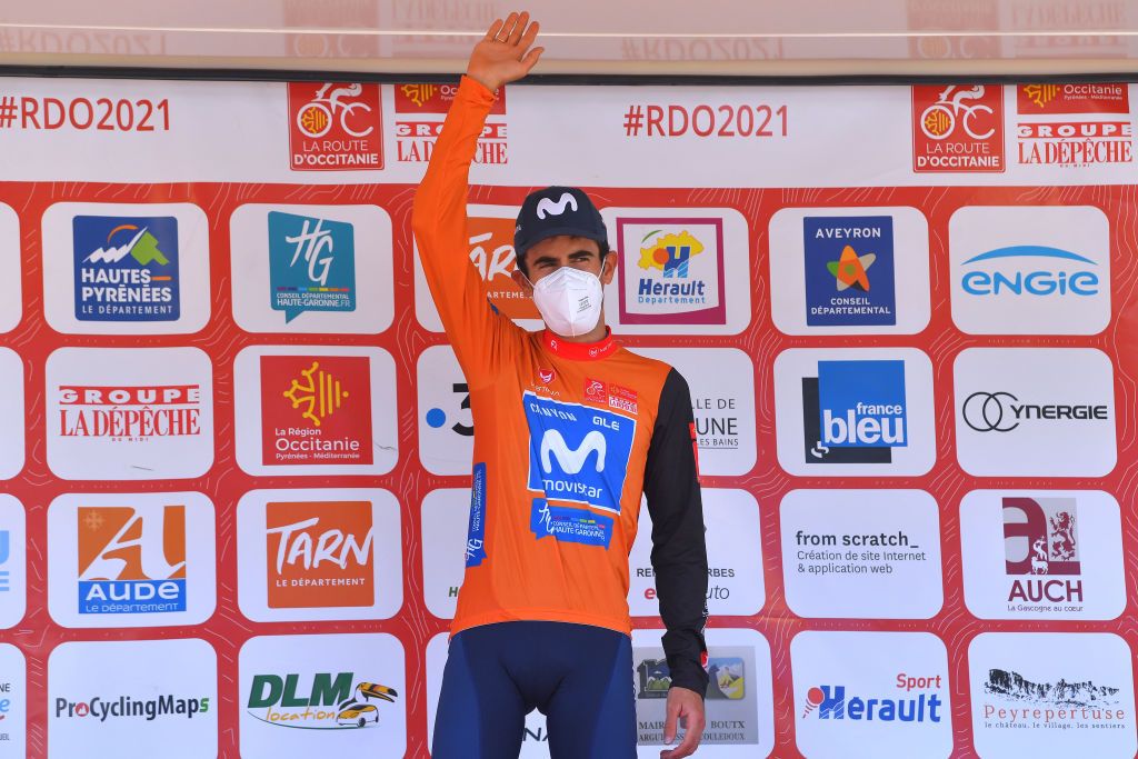 DUILHACSOUSPEYREPERTUSE FRANCE JUNE 13 Antonio Pedrero Lopez of Spain and Movistar Team Orange Leader Jersey celebrates at podium during the 45th La Route dOccitanie La Depeche Du Midi 2021 Stage 4 a 1512km stage from Lavelanet Pays dOlmes to DuilhacsousPeyrepertuse 648m RDO2021 RouteOccitanie on June 13 2021 in DuilhacsousPeyrepertuse France Photo by Luc ClaessenGetty Images