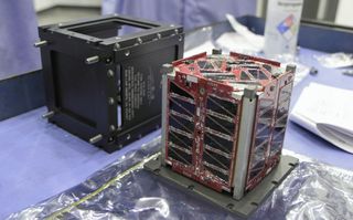 This tiny cubesat, dubbed TJ3Sat, is set to launch into space on Nov. 19, 2013. It will be the first satellite designed and built by high school students to be sent into orbit.