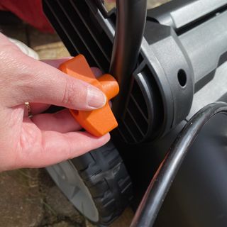 Attaching handle to base of Worx lawn mower