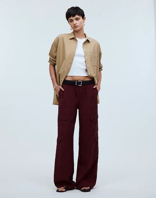 Madewell model wearing cargo pants, white t-shirt, and beige jacket