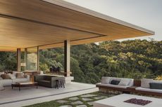 Bravissima House by Arthur Casas, a brazilian house nestled among the forest canopy and rising above the foliage to long views from large windows and ample terraces