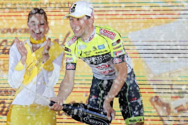 Oscar Gatto (Farnese Vini) sprays the champagne in celebration