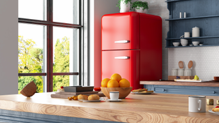 Kitchen with bright red fridge