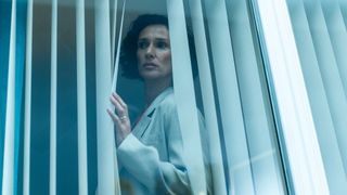 Fiona (Indira Varma) looks out of her window at Tommy (Ewen Bremner) in Coldwater episode 5