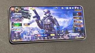 The Xiaomi 14T open to the home screen of Call of Duty: Mobile