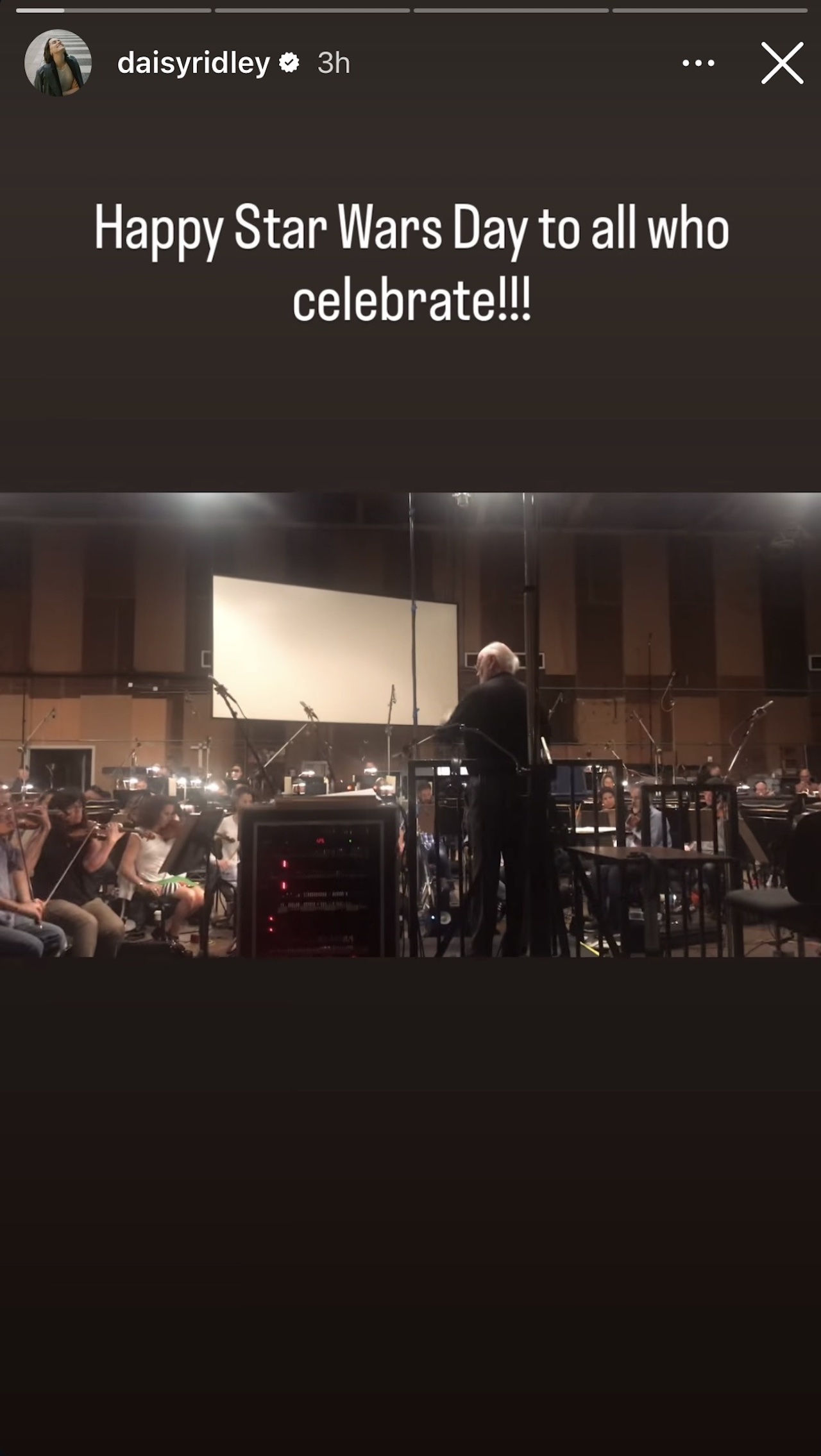 Daisy Ridley's IG Story with John Williams conducting.