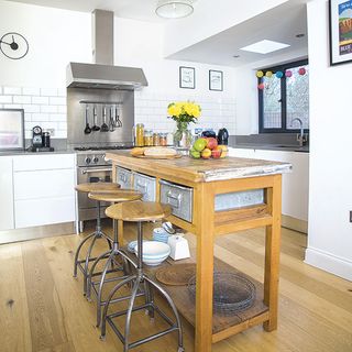 kitchen with wooden flooring and stools