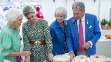 Duchess Sophie with Alan Titchmarsh and Mary Berry view and try some of the cakes and breads on display during a visit to the Royal Windsor Flower Show at Windsor Great Park on June 8, 2024 in Windsor, England