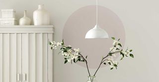 Off white living room with circle painted in soft pink